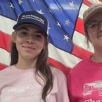 Harriet and Elleigh wearing GTCU hats.