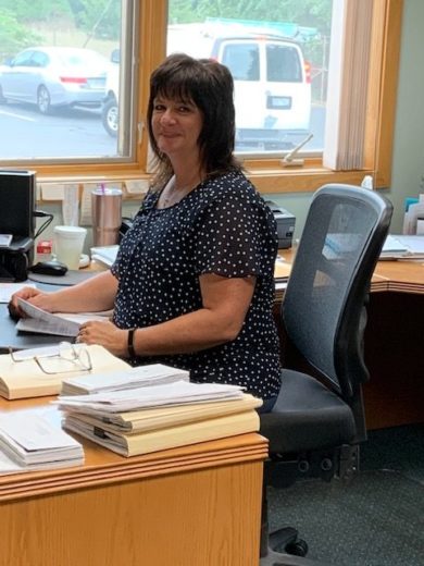 Employee sitting at her desk at the branch