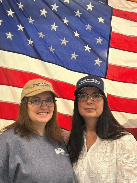 LuAnn and Courtney wearing GTCU hats.